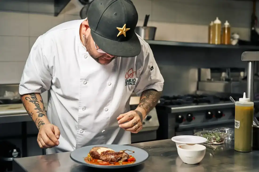 Chef plating a dish