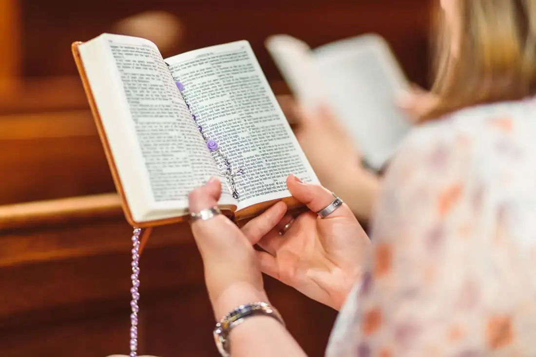 Someone reading an open Bible