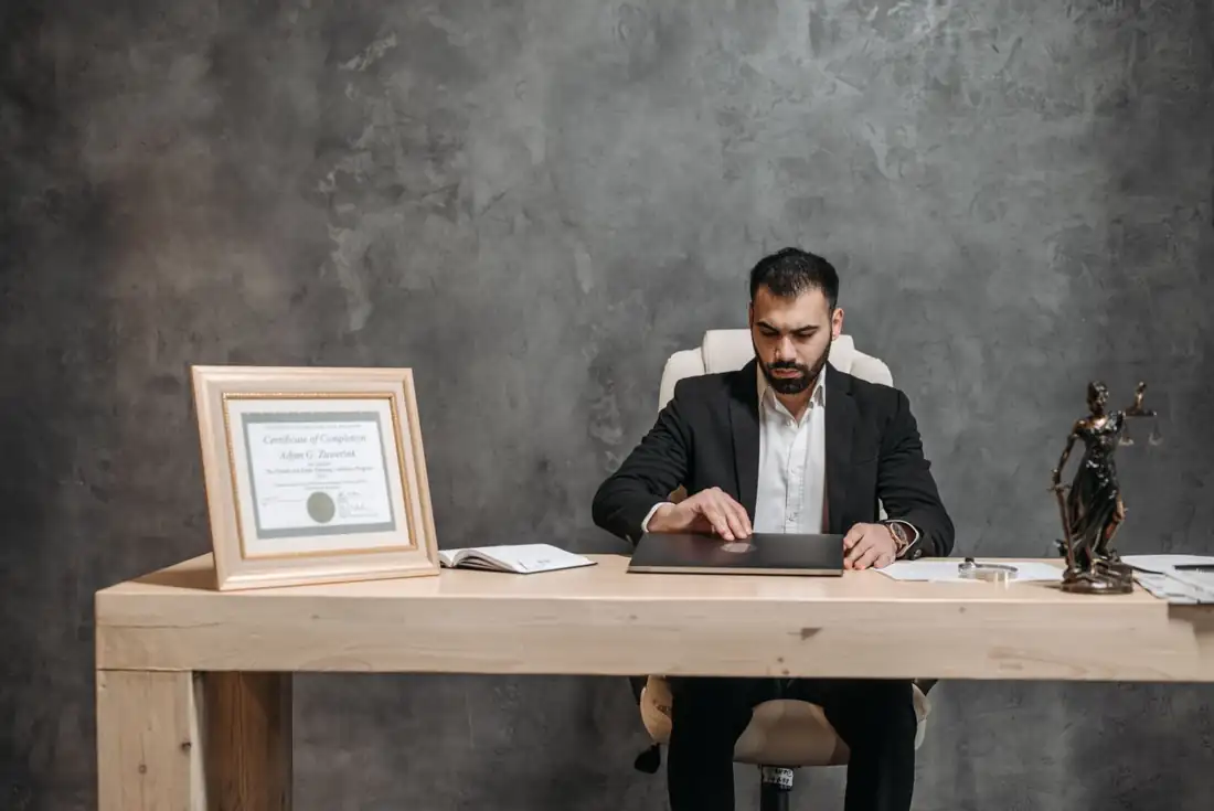 Henry Osei, attorney, at his desk